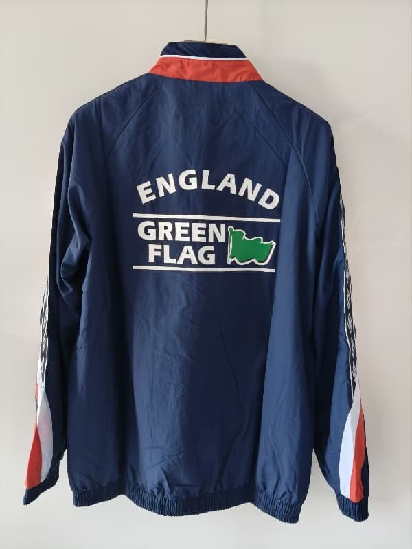 Thailand Quality(AAA) 2026 England Dark Blue Soccer Windbreaker
